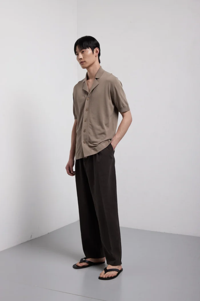 Short-sleeve cotton button-up shirt.