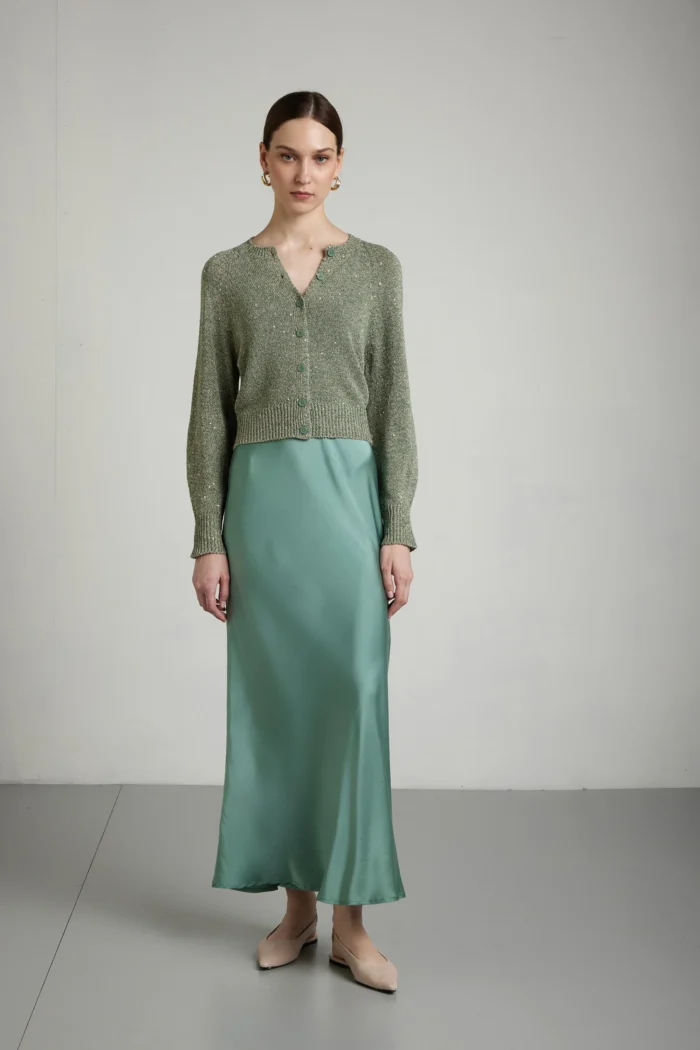 Short cardigan with sequins.